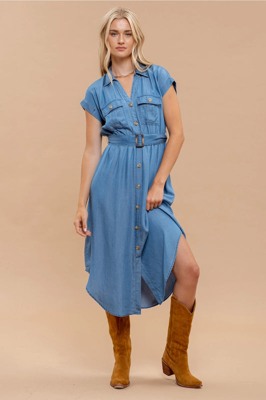 Woman wearing chambray button down belted midi dress with short sleeves and pockets