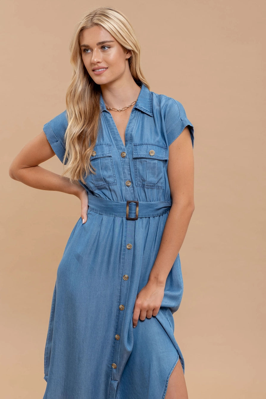 Woman wearing chambray button down belted midi dress with short sleeves and pockets