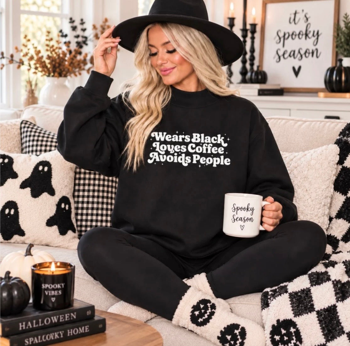 Wears Black Graphic Tee or Sweatshirt