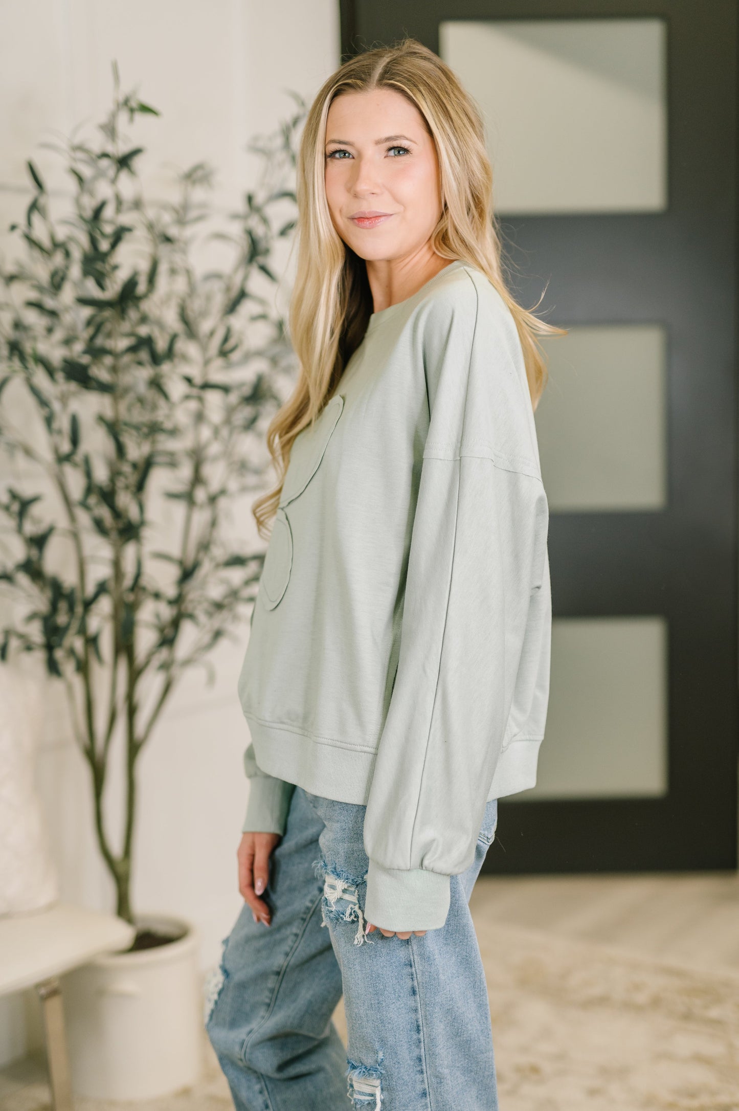 Petal Poise Floral Applique Pullover in Ivy